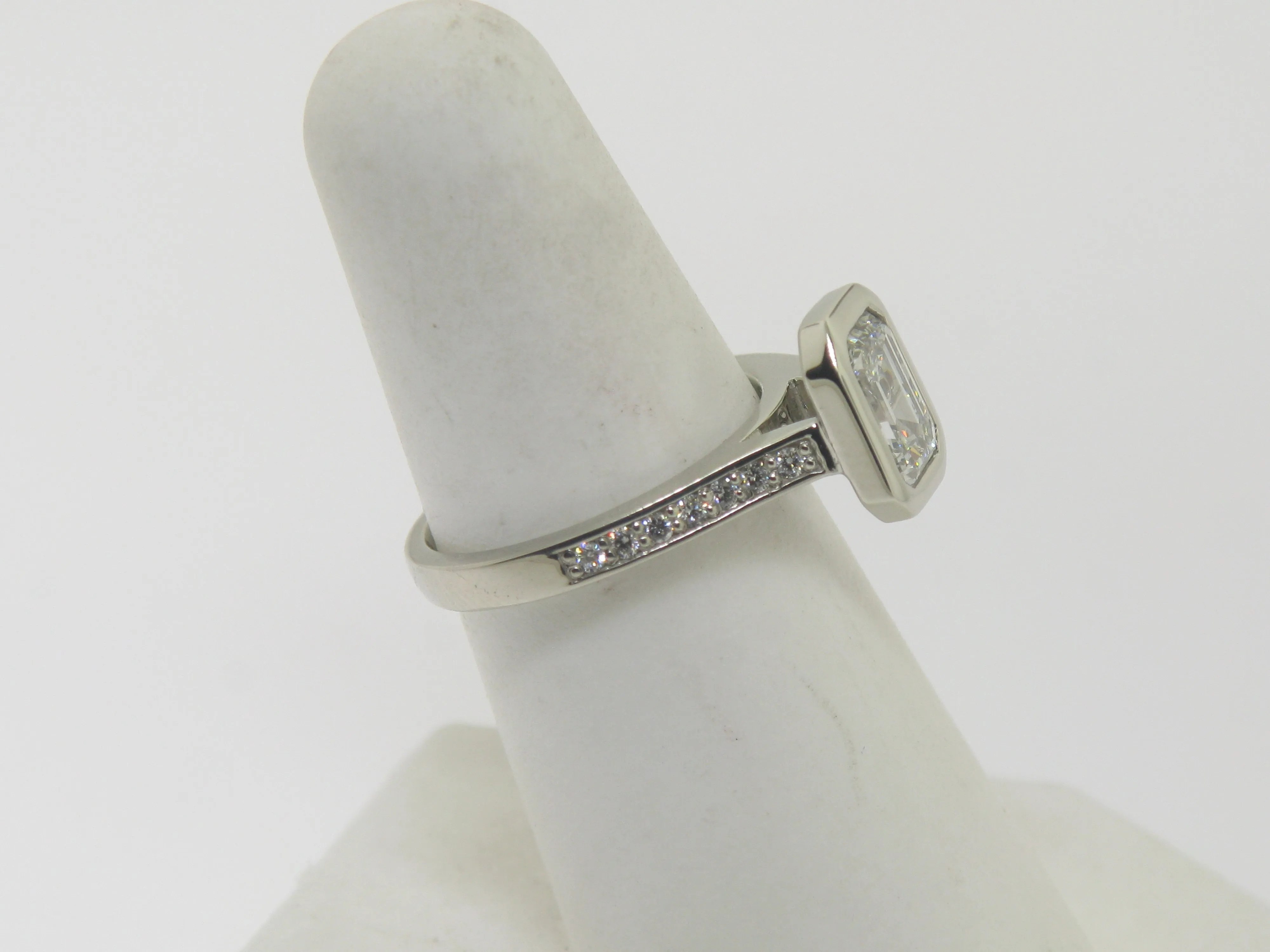 Emerald Cut Diamond In Wide Edge Bezel