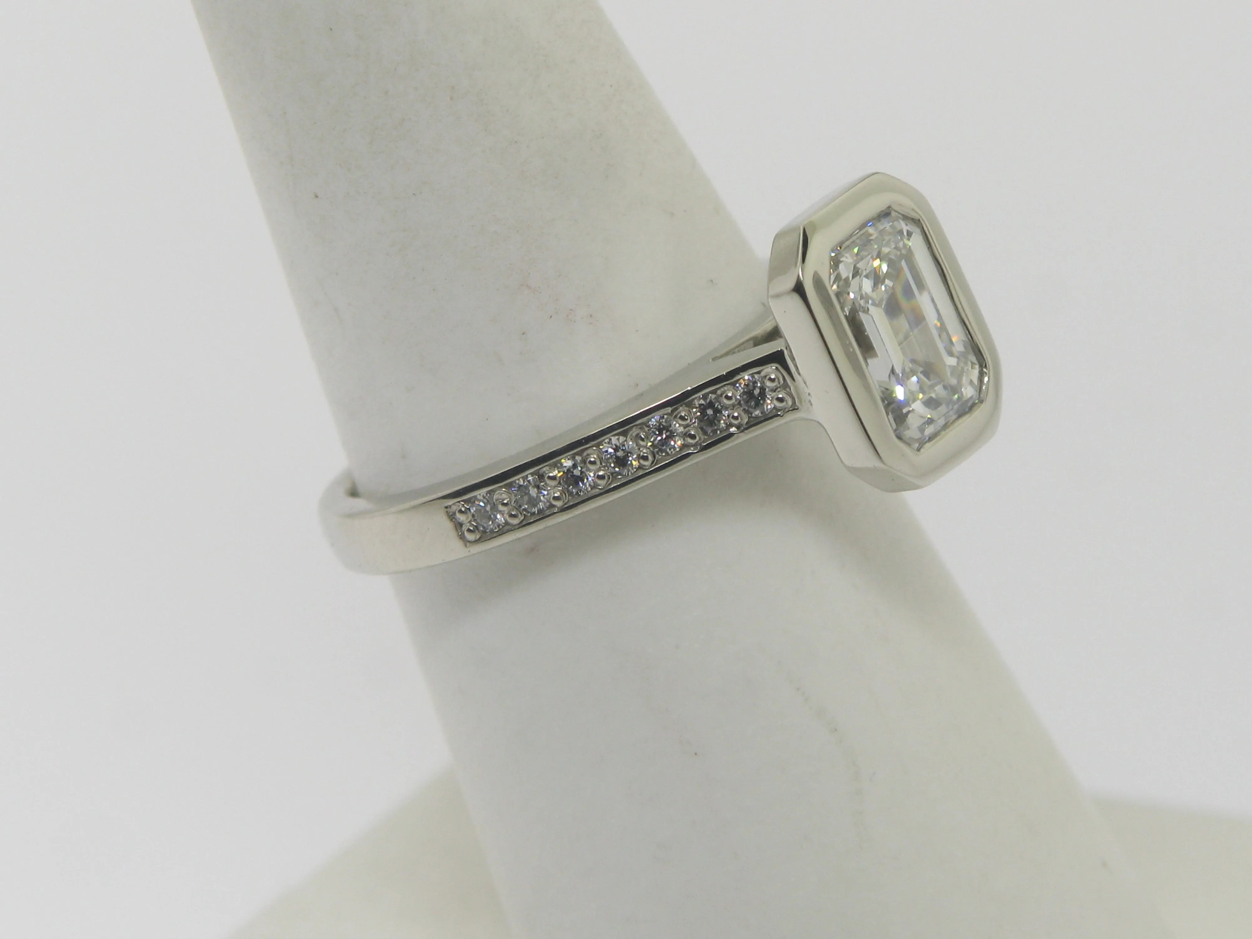 Emerald Cut Diamond In Wide Edge Bezel