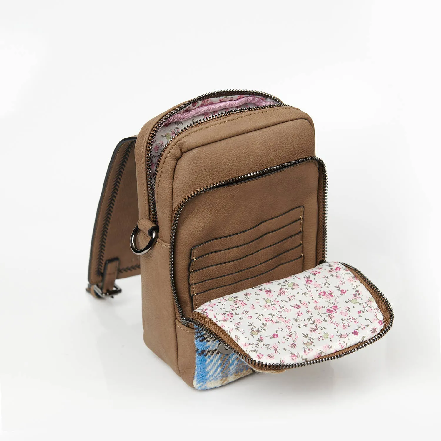 The Baby Jura Crossbody Backpack