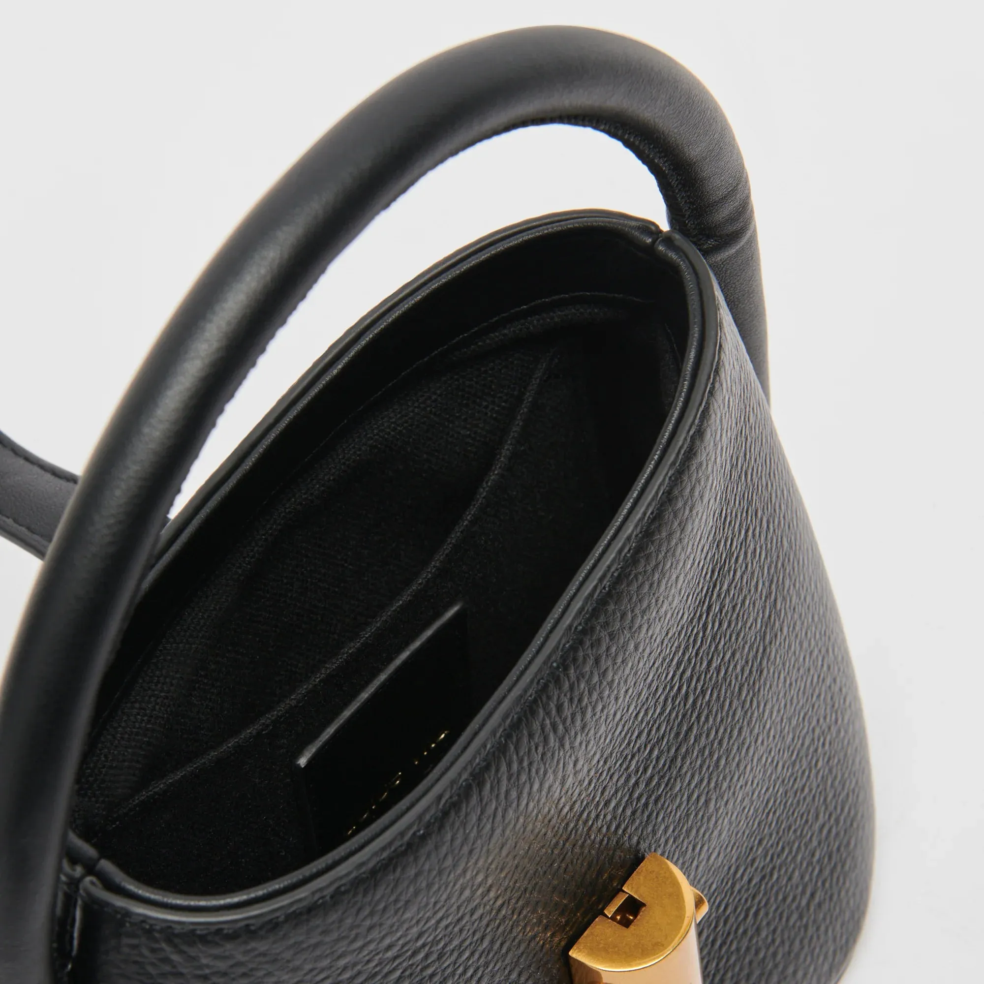 The Neve Mini Bucket Bag by Dolce Vita - Black Leather